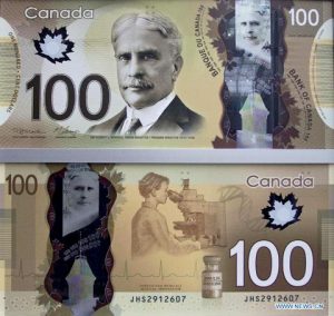 Hai mặt của tờ tiền 100 đôla Canada đã đưa vào lưu hành hôm 14/11/2011. Ảnh: Xinhua.